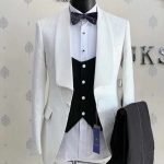 White Suit With Black Jacket And Black Trousers