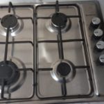 Gas cooker with oven and extractor